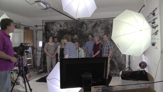 Taking a family group portrait.